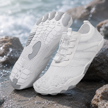 Chaussures d'eau unisexe type « pieds nus » | Système d'auto-sauvetage gonflable | Traite le pied d'athlète | Voûte plantaire en mousse à mémoire de forme | Imperméables, respirantes et anti-sable | Chaussures aquatiques ultra-légères à séchage rapide